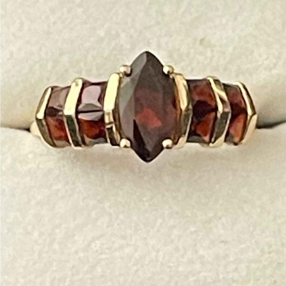Deep red garnet diamond cut ring